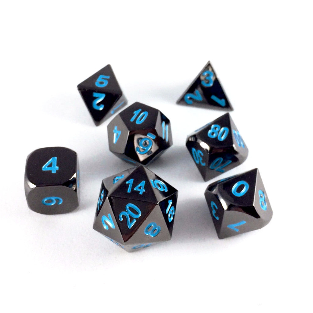 Metal Black Frost dice set scattered on a white background
