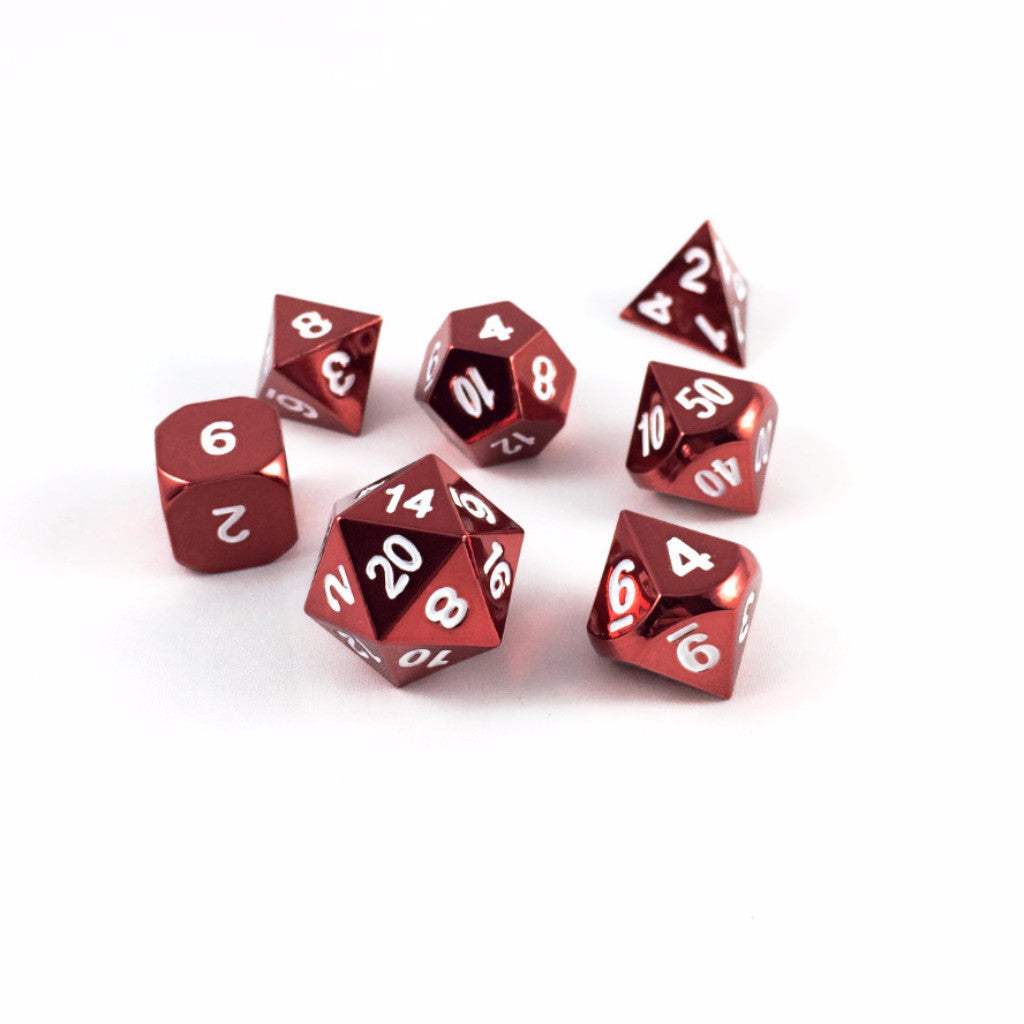 Radiant red dice set scattered on a white background