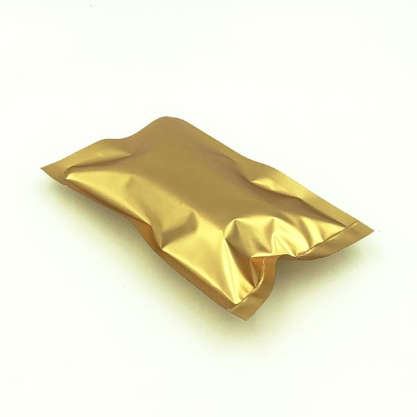 Gold foil bag on a white background