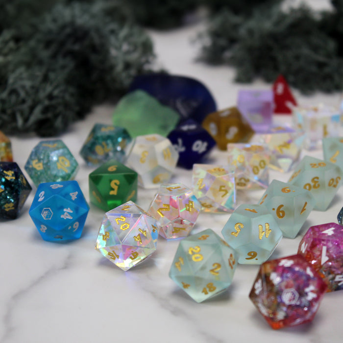 DnD Dice sets made from glass and colored glass.