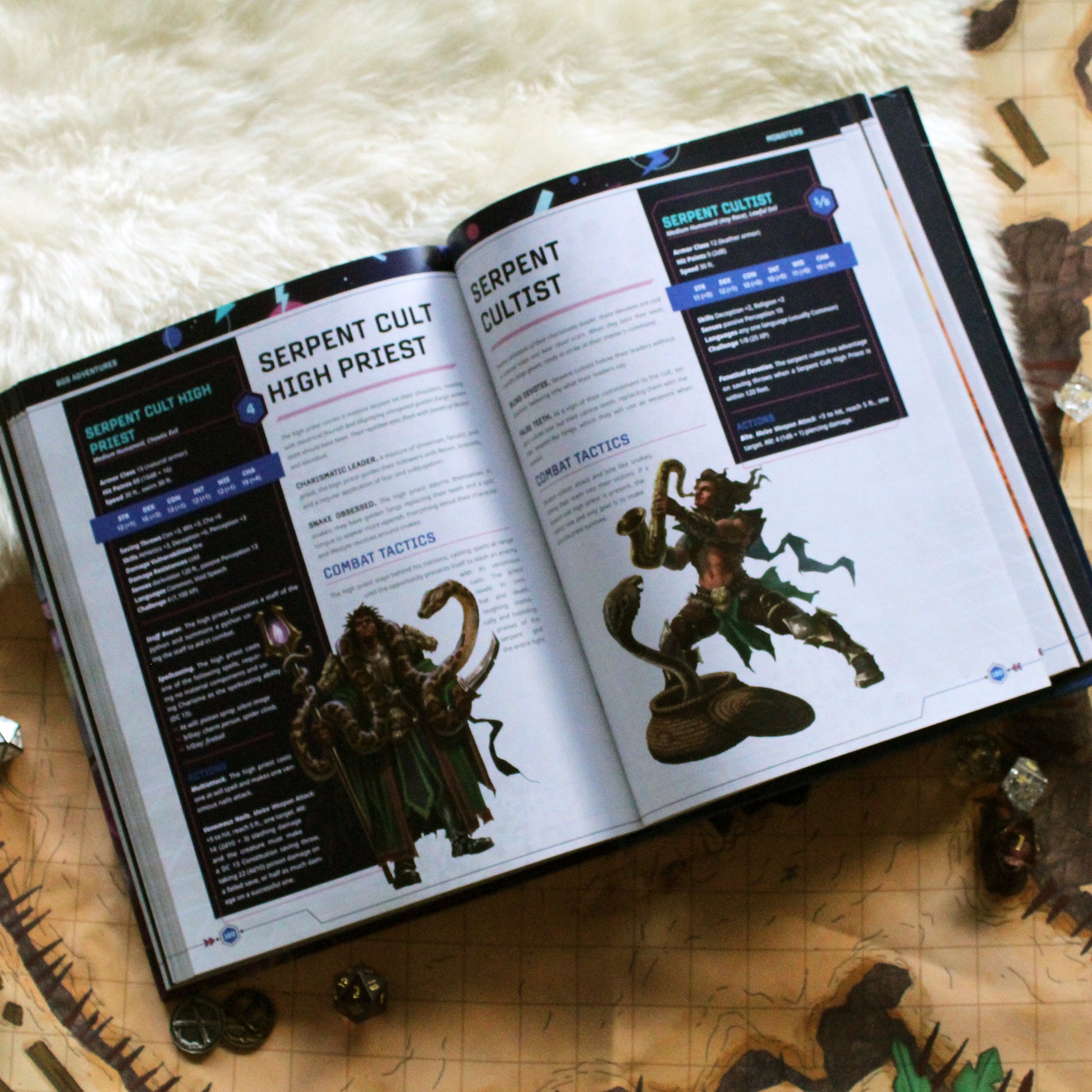 Open book showing dungeons and dragons monsters statistics with figurines on a map