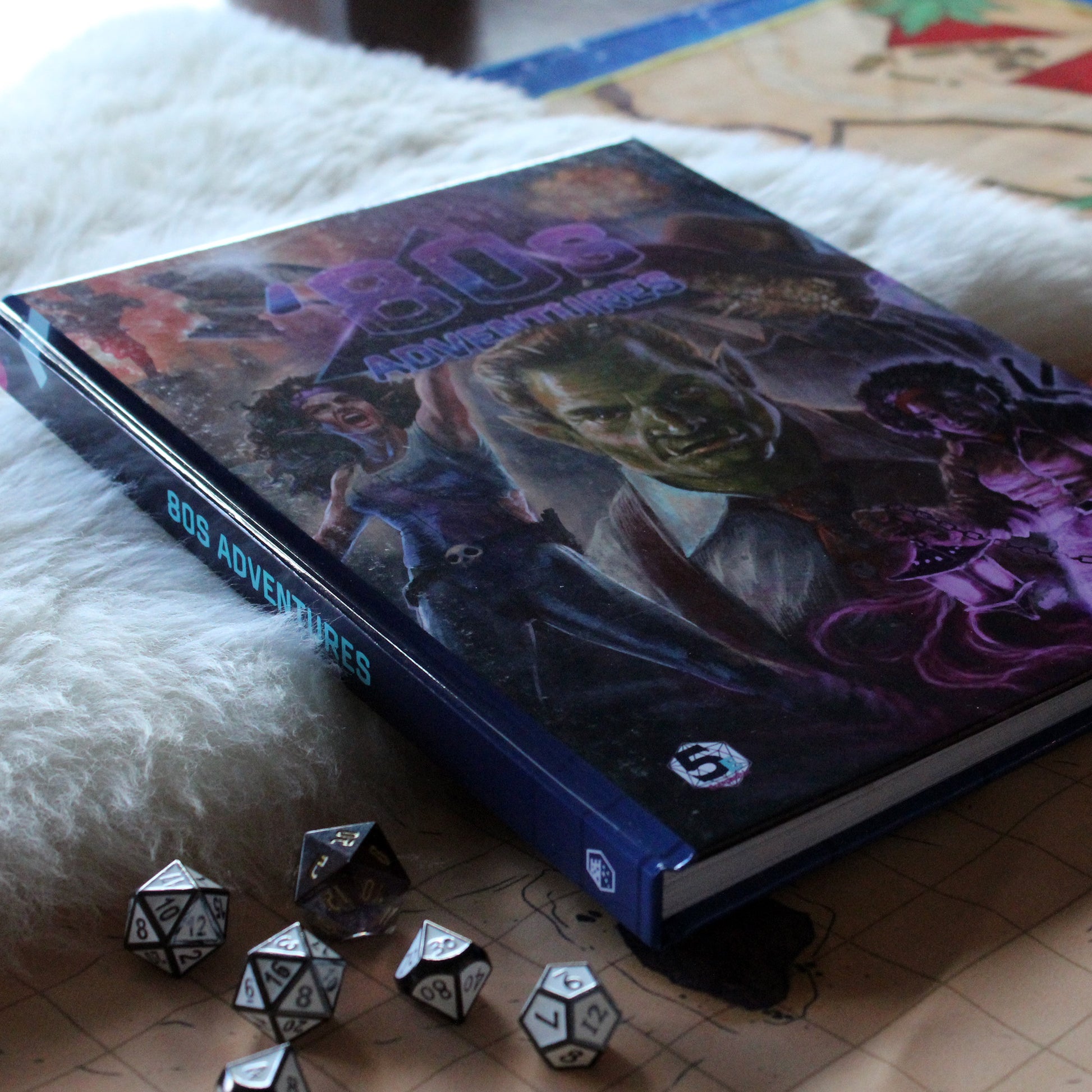 Role-playing game book "80s Adventures" with character illustrations on a surface with dice.