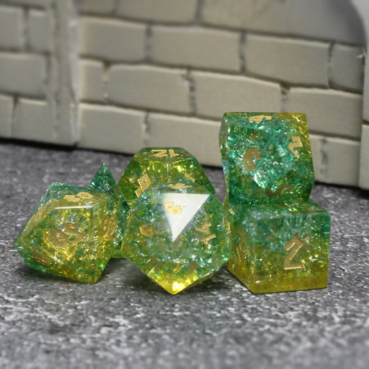 Shattered Glass green dice set grouped in a game space, perfect for tabletop RPGs like Dungeons and Dragons.