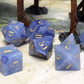 Blue gemstone dice set with 1920s style lettering.