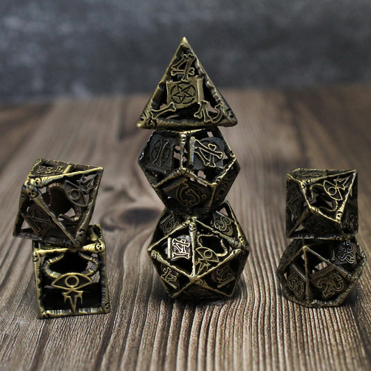 Full Warlock Cage Dice Set in bronze, showing the demonic sigil of an eye with curved horns on the highest number of each die and intricate rune designs.