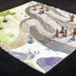 Isometric photo of a cliffside path battle map with adventurers scattered on top of it