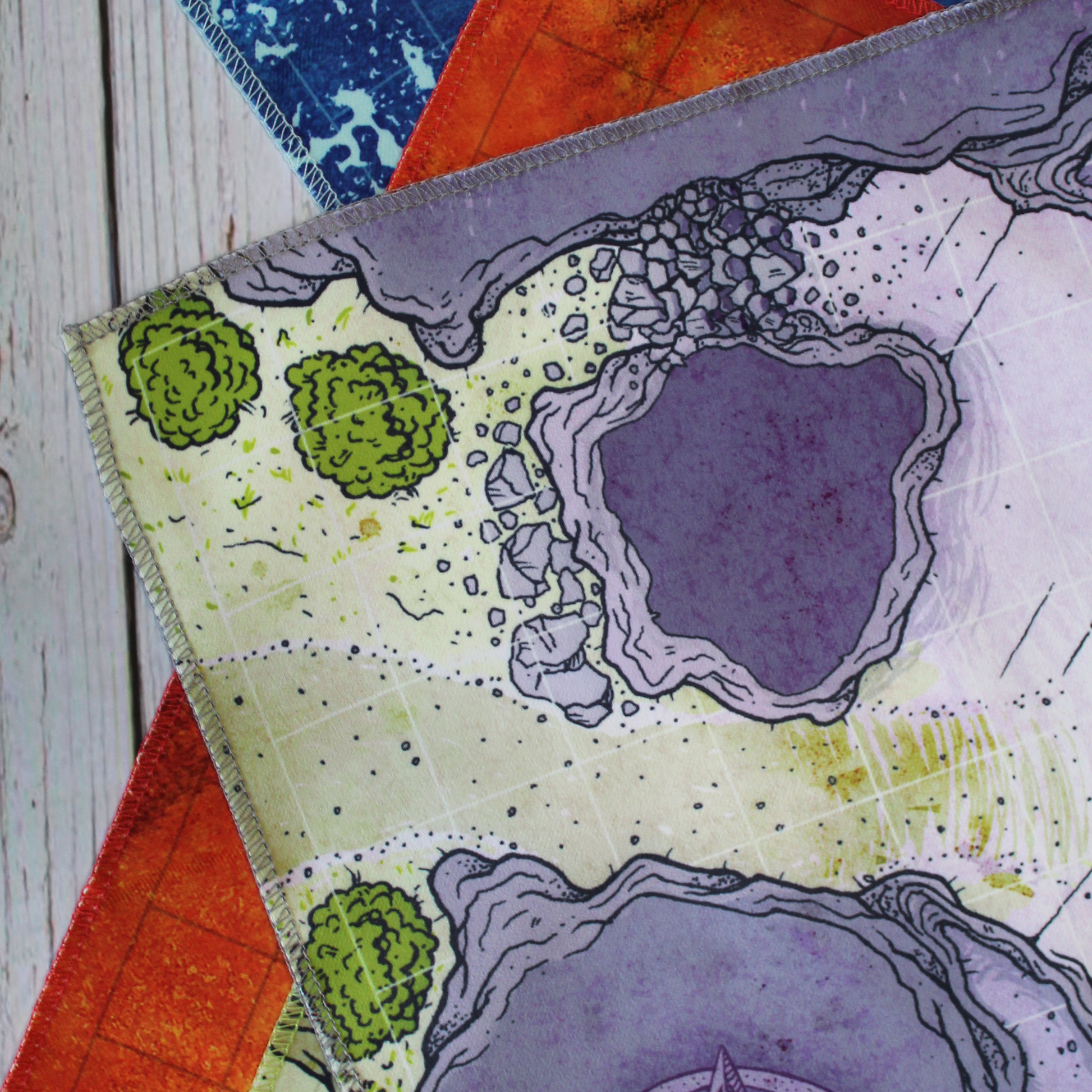 Closeup photo of the corner of a cave battle map showing edge stitching