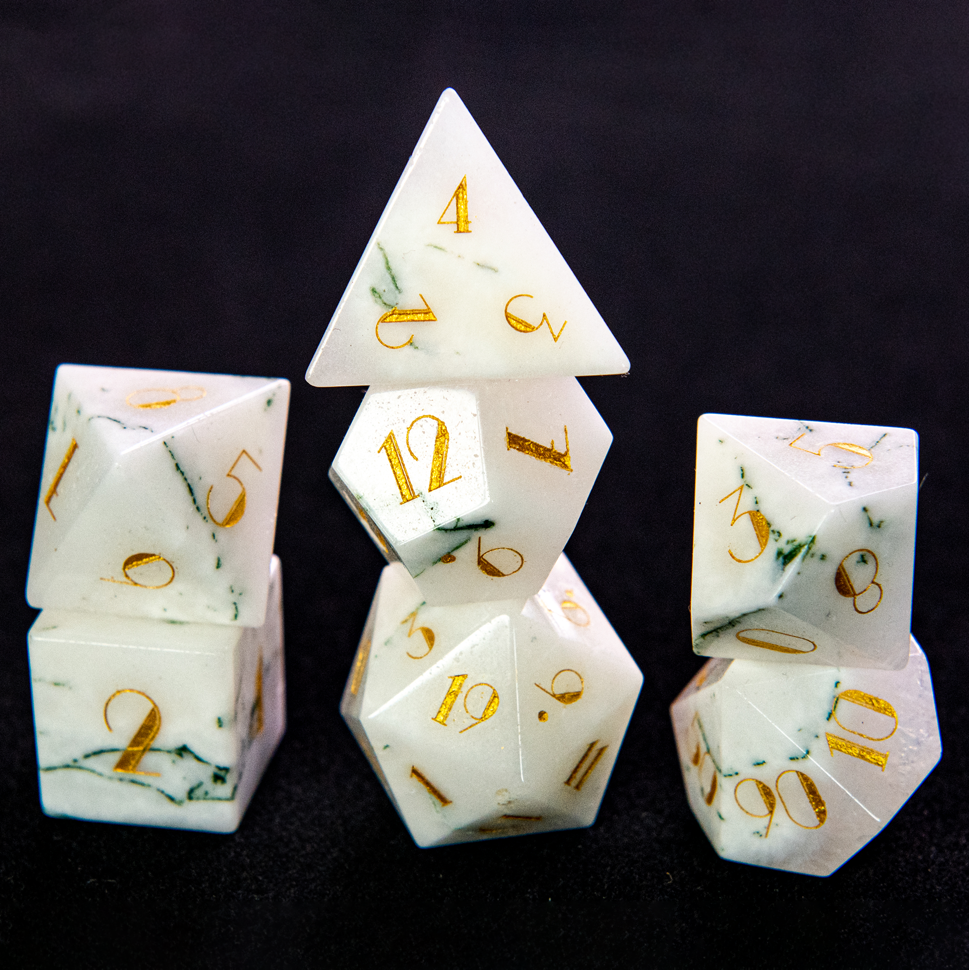 Dendritic Agate gemstone dice set with marbled patterns and gold 1920s-inspired numbering, perfect for Dungeons & Dragons and other tabletop RPGs.