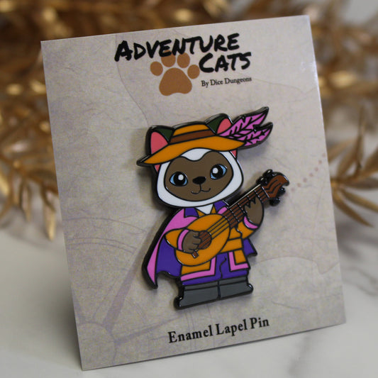 Adventure Cats bard enamel pin displayed with its illustrated backing card, highlighting the cat dressed as a bard holding a lute.