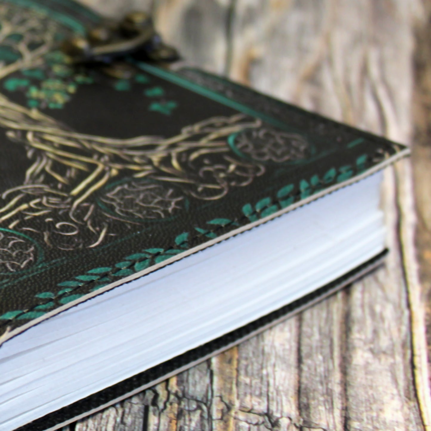 High-quality leather tabletop gaming journal inspired by mythic world tree symbolism, built for long D&D sessions
