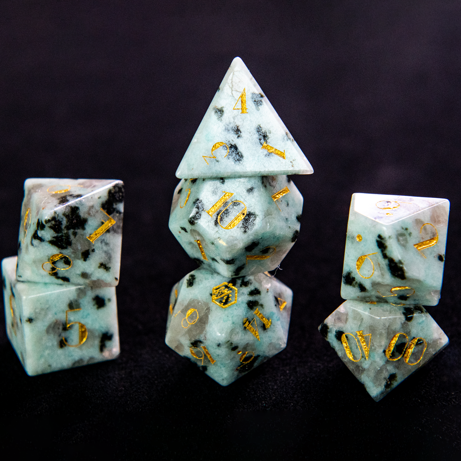 Milky Jasper gemstone dice set with gold numbering, featuring swirling white patterns and a vintage 1920s design, perfect for Dungeons & Dragons and other tabletop RPGs