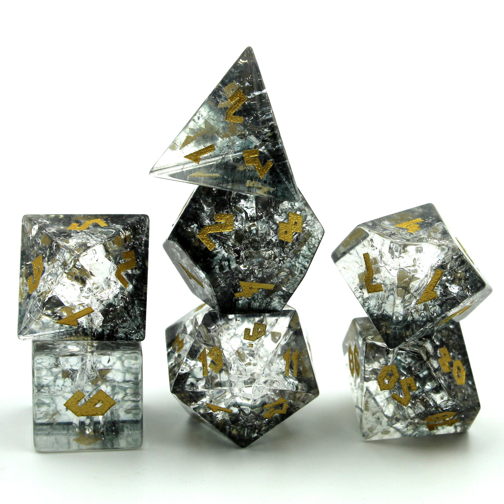 Stacked dice set against a white background, highlighting the glowing effect from cracked glass.