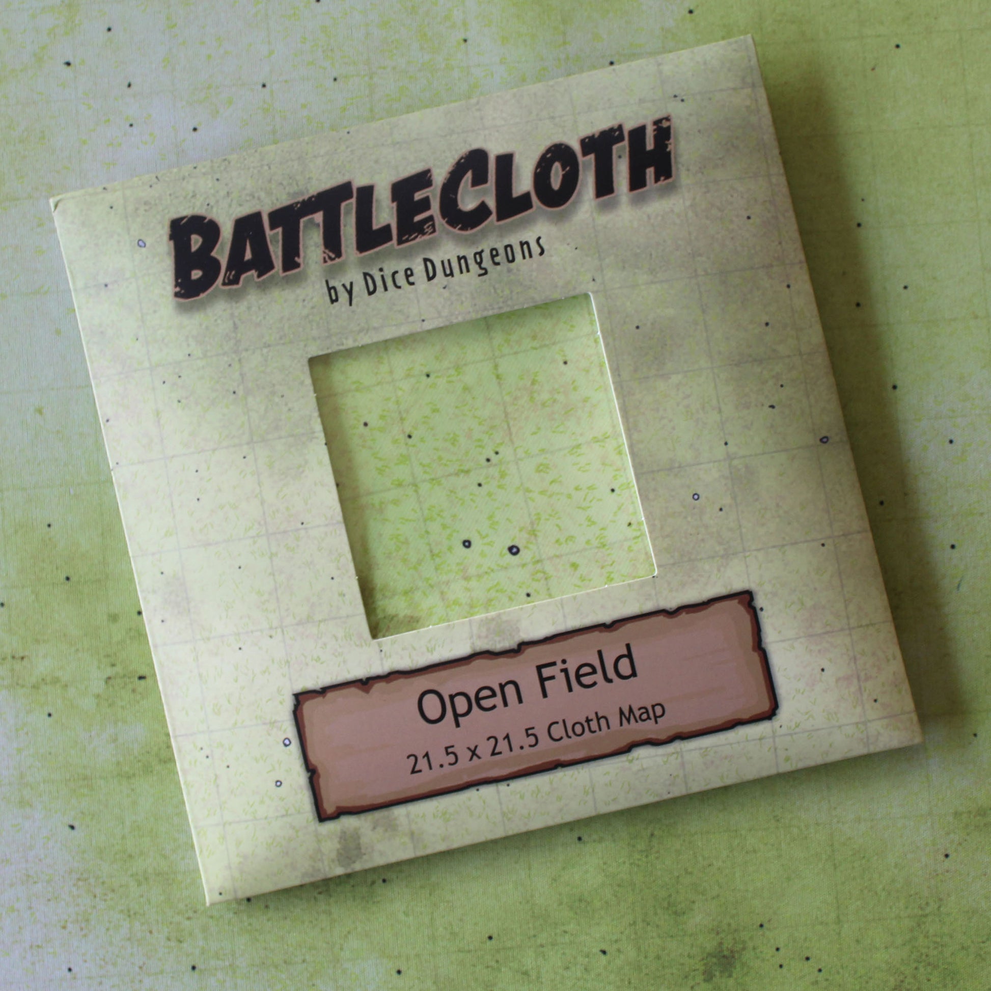 Battlecloth by Dice Dungeons packaging on a textured green background