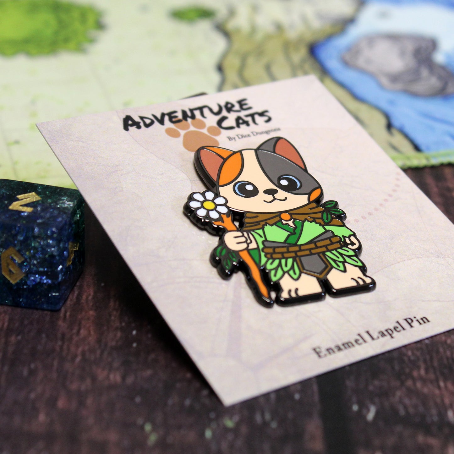 Adventure Cats druid enamel pin shown with its illustrated backing label, highlighting the feline druid.