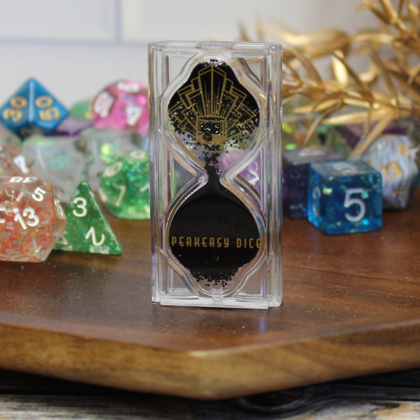 Speakeasy Dice Reverse Game Timer on a table with RPG dice in the background, featuring a reverse countdown and the elegant Speakeasy Dice logo. A stylish 1920s-inspired accessory for TTRPG and Dungeons & Dragons game sessions.