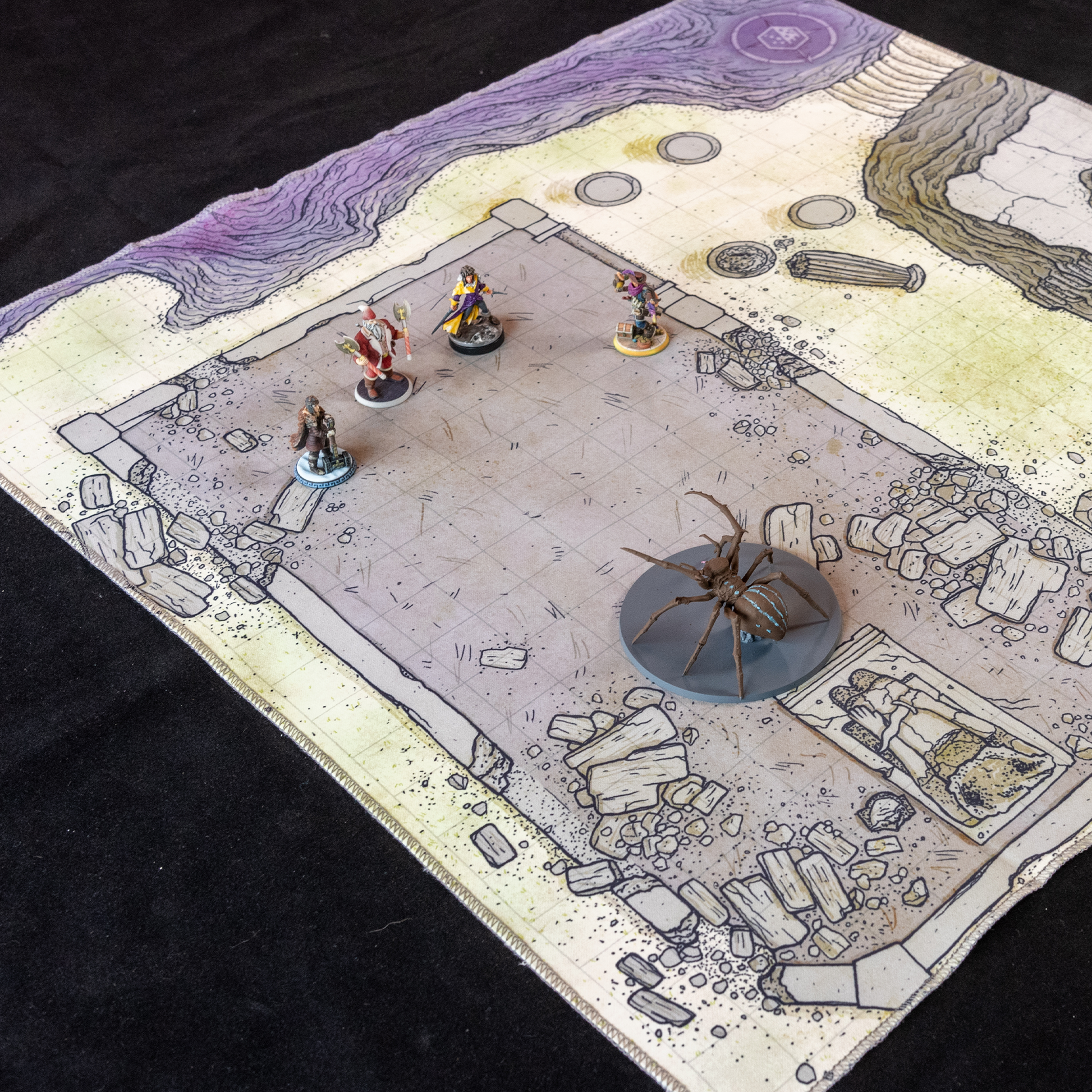 Isometric photo of a ruined temple battle map with multiple adventurers placed on it 