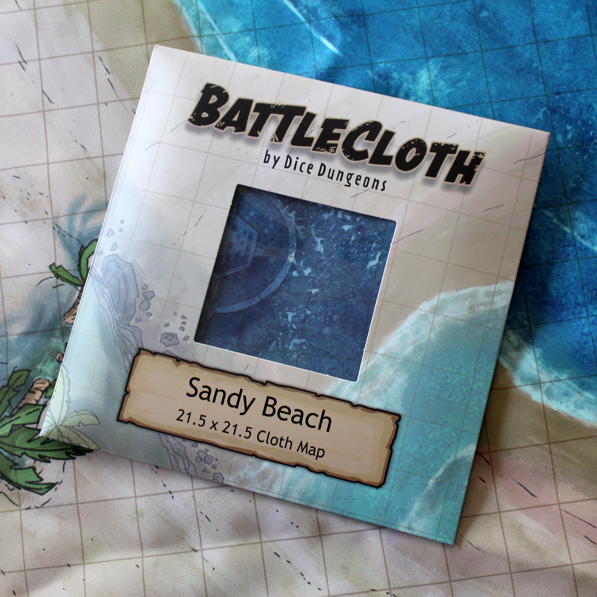 Battlecloth packaging for 'Sandy Beach' on a grid surface