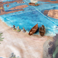 Isometric photo of a beach battle map with multiple miniature figures on it