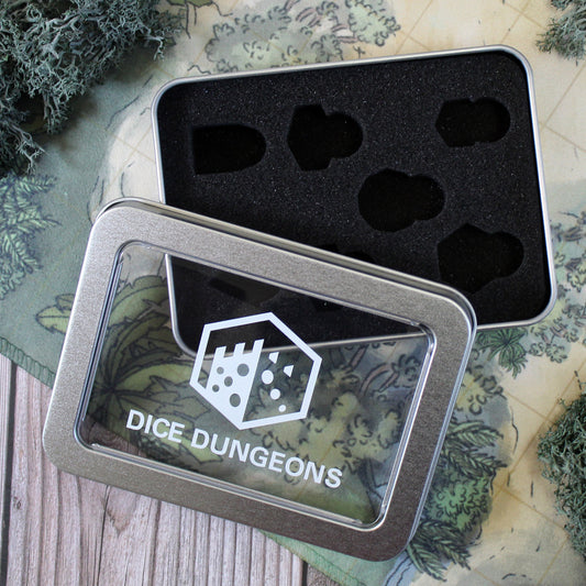 Dnd dice box open on game table. Hold 7-piece dice sets.