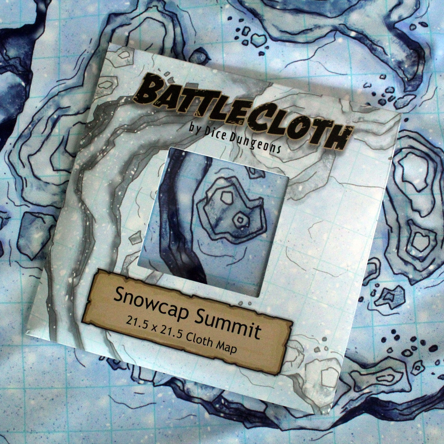 Photo of battle map retail packaging that says "BattleCloth by dice Dungeons, Snowcap Summit"