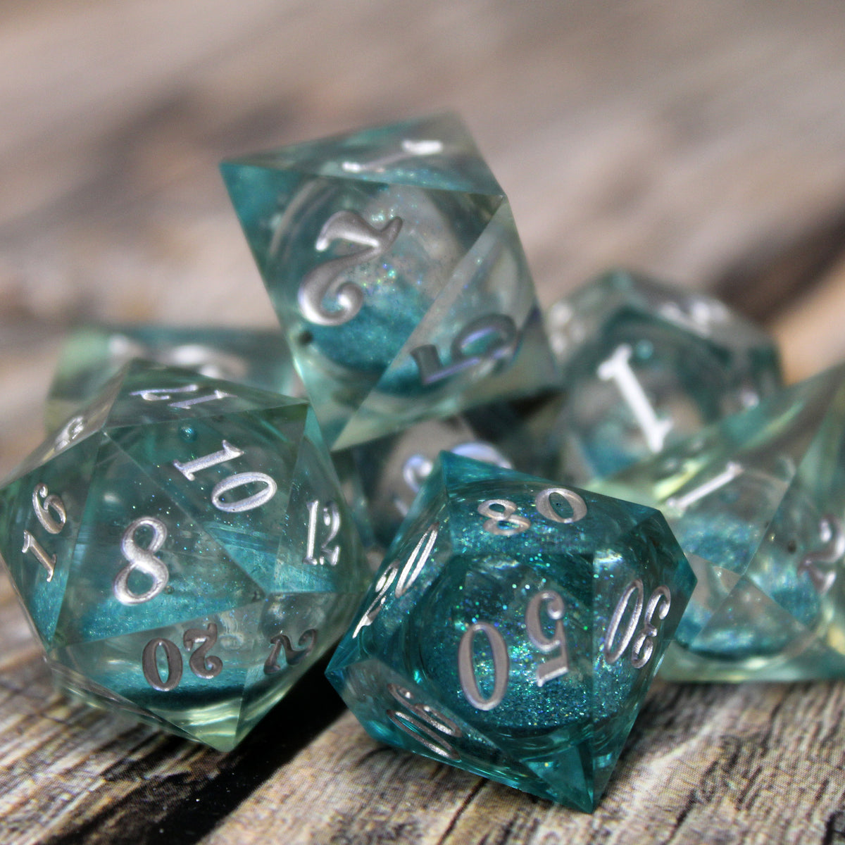 Blue and Silver liquid core dice set inspired by the modern cocktail, Blue Hawaiian