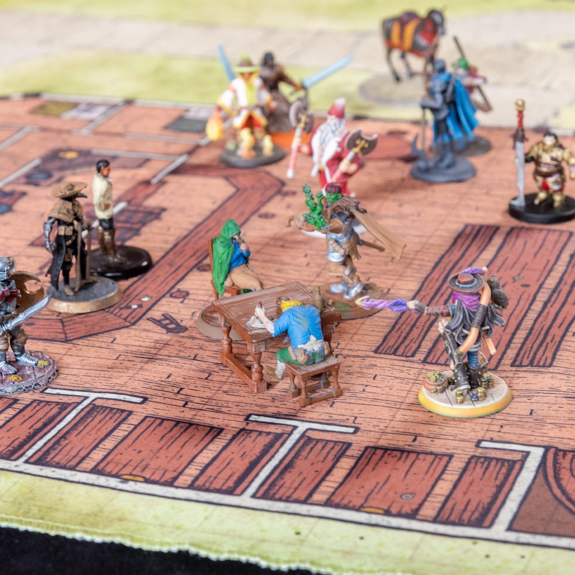 Closeup photo of a tavern battle map with multiple adventurers on it