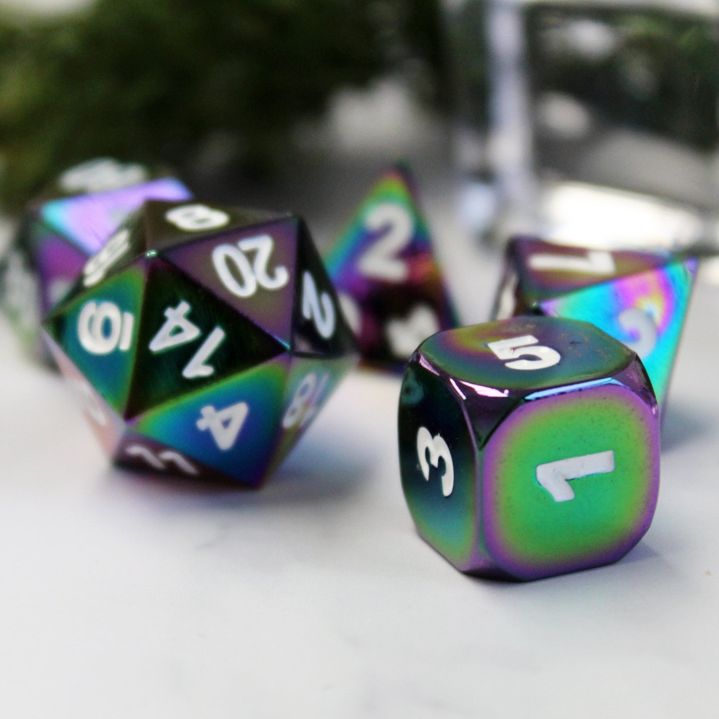 Chrome color metal dice set closeup.