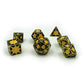 Gold metal dice with enamel inset as dragon scales - enamel is black and yellow. 