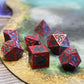 Metal DragonScale Red Dice Set on Table