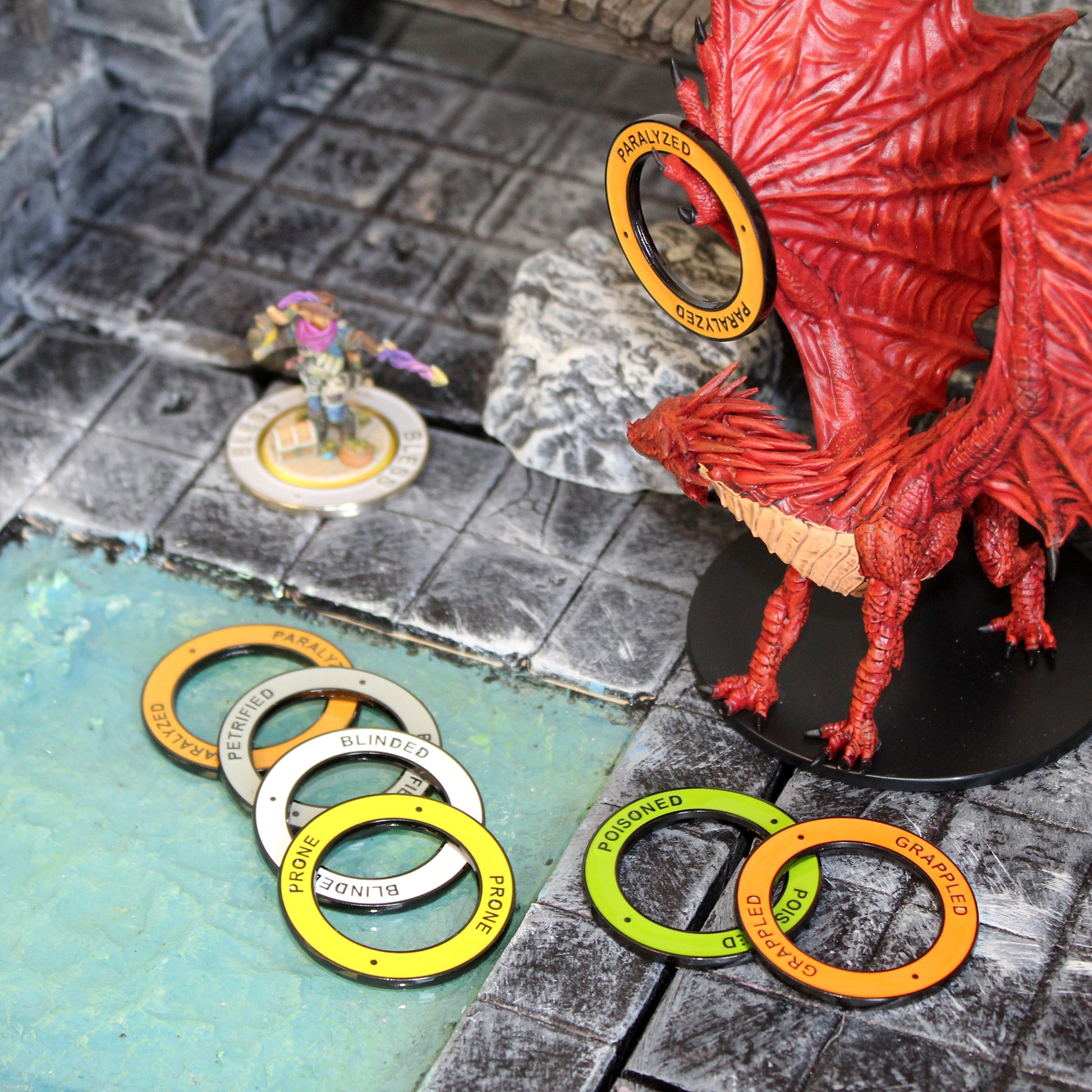 paralyzed d&d condition ring on a red dragon