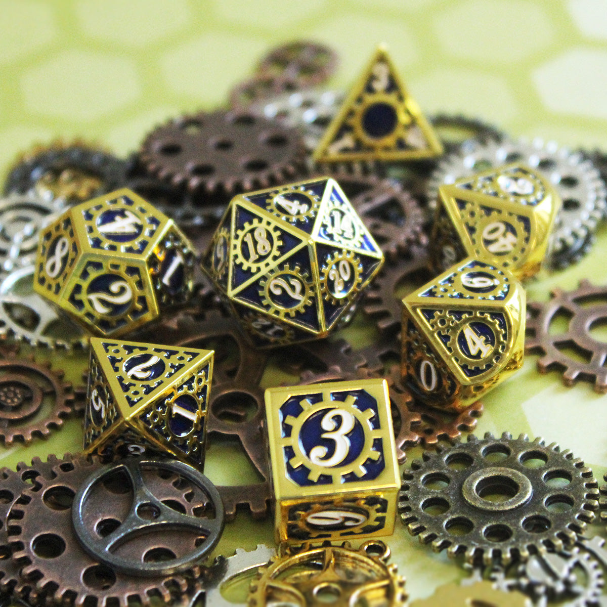 Gear style dice set inspired by dwarven mechanists arranged on a layer of decorative cogs and gears.  Each die has a golden gear incorporated into each face.