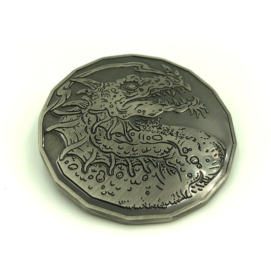 Adult Smoke Dragon monster token in antique silver displayed on a white background, showing intricate dragon artwork.