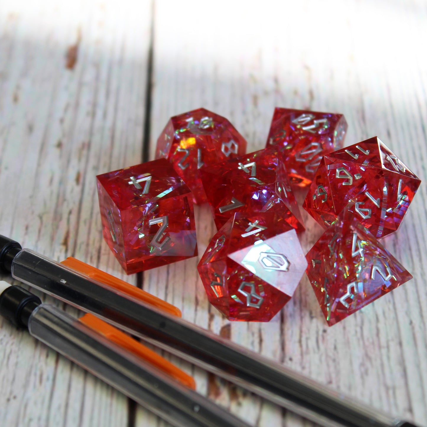 StarGlow Red Sharp Edge Resin Dice Set