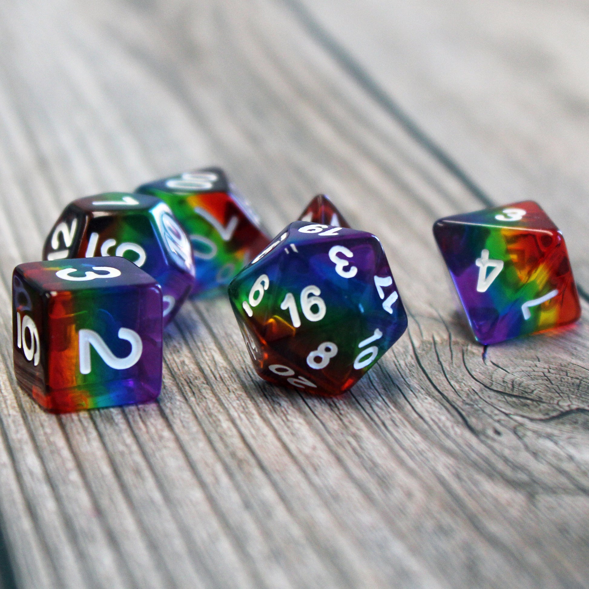 Rainbow Layered Plastic Dice Set closeup.