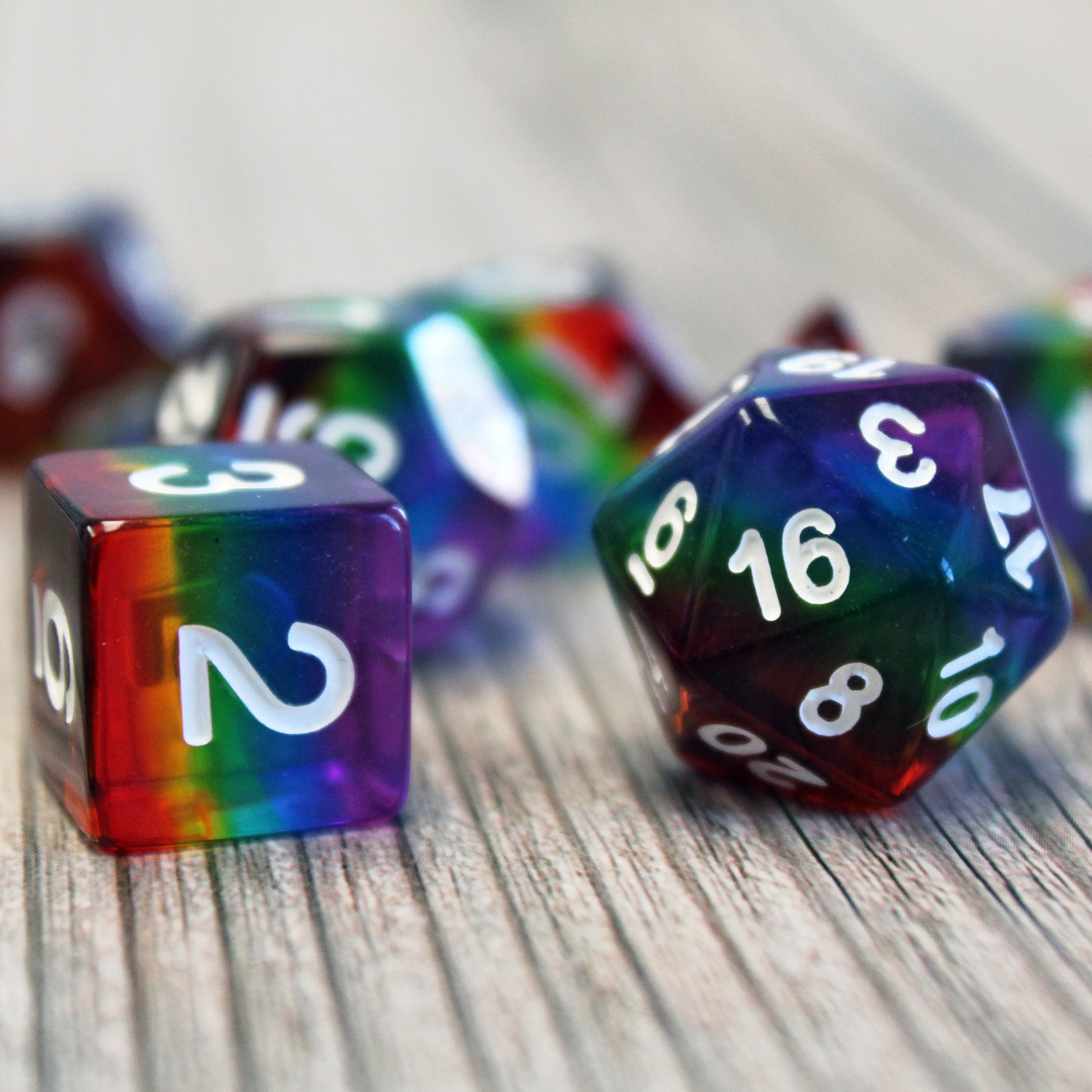 Rainbow Layered Plastic Dice Set closeup.