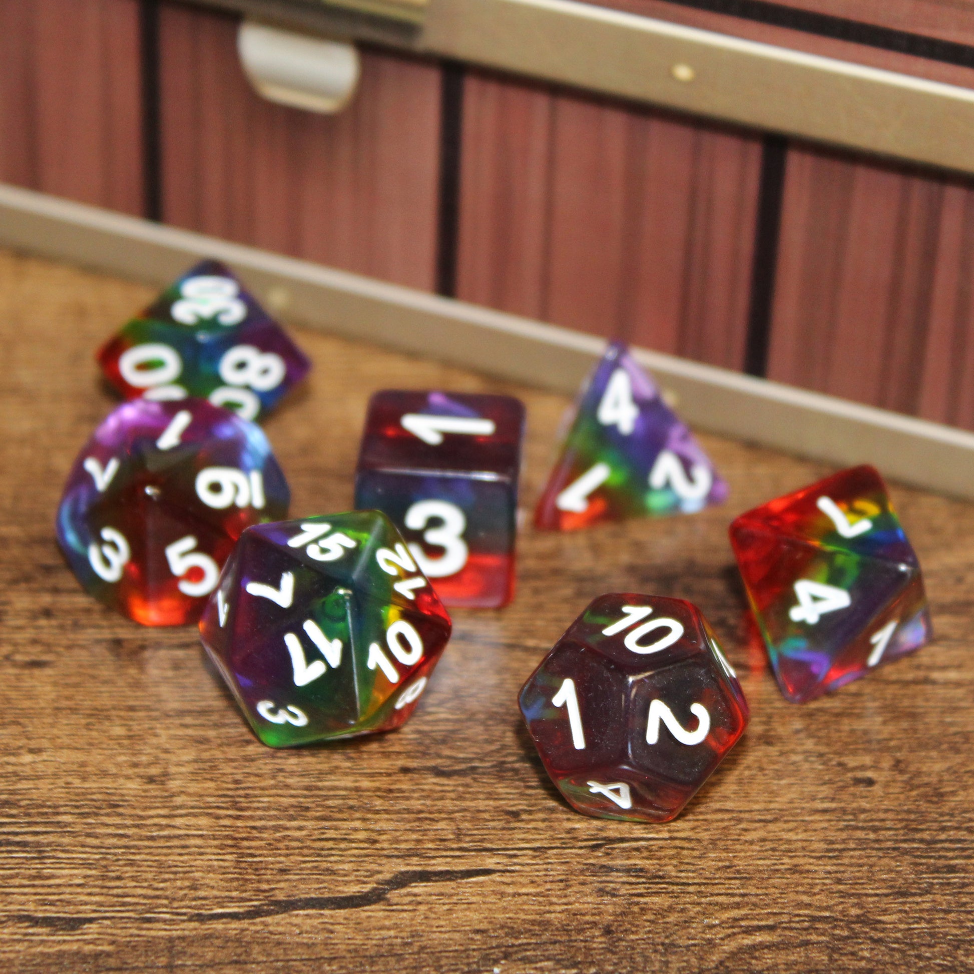 Rainbow Layered Plastic Dice Set in light