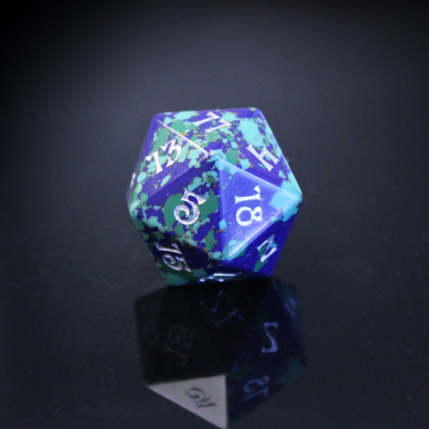 D20 die from Gaia Set on black background, showcasing natural-inspired colors for tabletop RPGs.